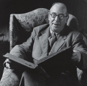 C. S. Lewis with Book